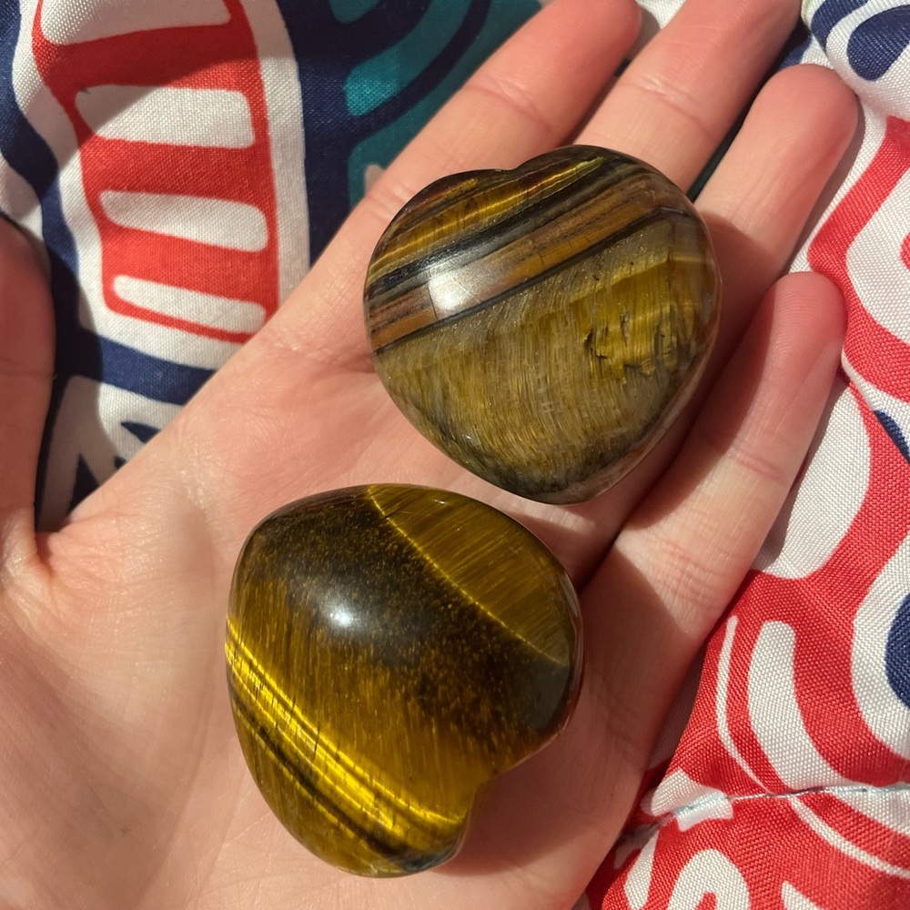 2 heart shaped tiger's eye crystals
